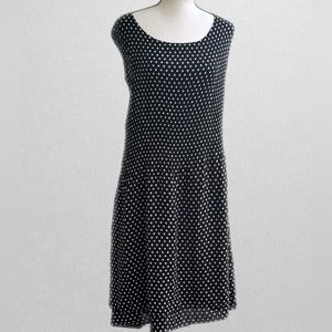 Black dress when pleats and white polka dots